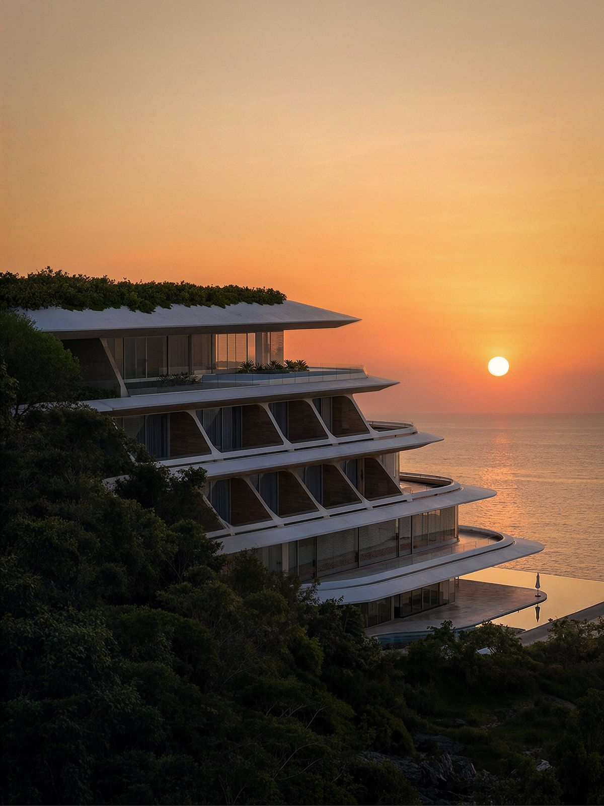 Resort escalonado sobre a encosta com o sol se pondo no horizonte